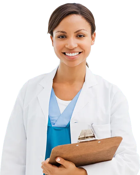 Smiling female doctor wearing white coat and blue scrubs holding a clipboard